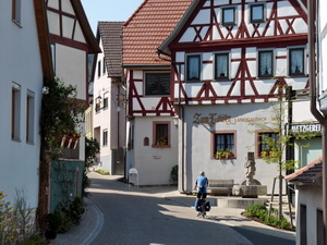 Riding through the pretty wine-growing village Erlabrunn